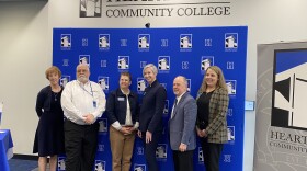 Faculty members of Heartland Community College and Millikin University gathered at a conference where they announced their new Transfer Partnership.