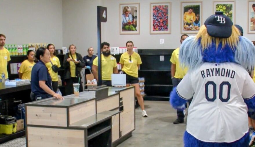 Tampa Bay Rays mascot Raymond welcomed community members to the free market and bistro.