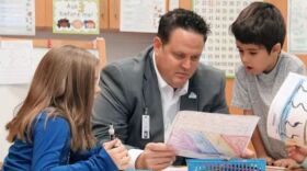 Virginia Beach Schools Superintendent Aaron Spence works with children in a classroom. (Image: VBCPS)