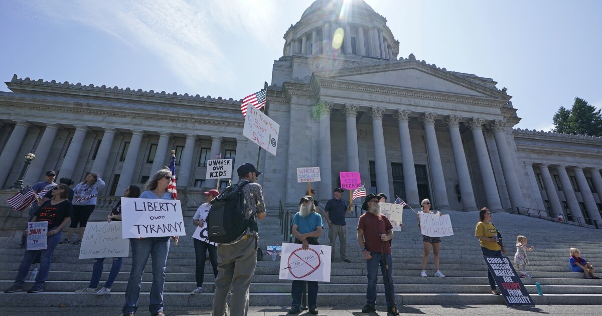 Vaccine Mandate, Long-Term Care Insurance Stirring Controversy In Olympia | Knkx Public Radio