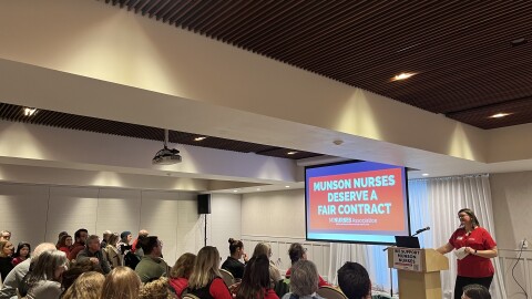 Laura Nilsson, president of the Munson nurses' union, speaks to a crowd at the Delamar Hotel on Thursday, March 26, 2026. (Photo: Claire Keenan-Kurgan/IPR News)