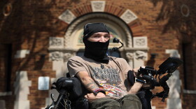 Philipe "Flip" Rivera on the Monroe County Department of Human Services campus where he spends time riding on the sidewalks in his powered chair.