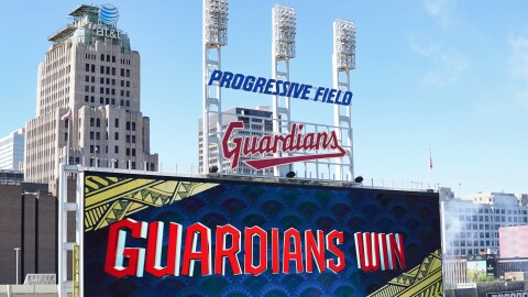 The scoreboard in the outfield at Progressive Field shows the Cleveland Guardians won  - June 30, 2022.