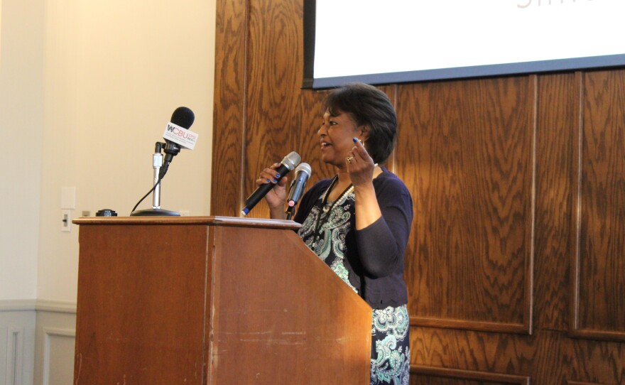 Peoria County Clerk Rachel Parker performs "What the World Needs Now Is Love" during Thursday's 50th anniversary dinner celebrating Peoria's sister city partnership with Friedrichshafen, Germany.
