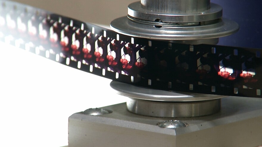 In this Dec. 15, 2015 photo, a strip of film is seen at the Moving Image Research Collections at the University of South Carolina in Columbia, S.C.