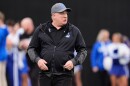 Kentucky head coach Mark Stoops walks the field before an NCAA college football game against Vanderbilt, Saturday, Nov. 22, 2025, in Nashville, Tenn.