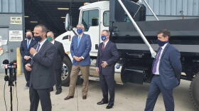 Palmer Trucks CEO John Nichols discusses the company's decision to expand during the coronavirus pandemic with Gov. Eric Holcomb, Indianapolis Mayor Joe Hogsett and other officials in attendance.