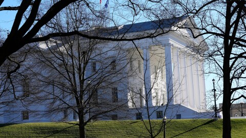 FILE - The state and U.S. flags fly over the Virginia State Capitol as the 2024 session of the Virginia General Assembly gets underway, Jan. 10, 2024, in Richmond, Va.