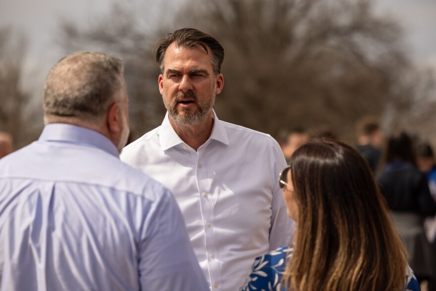 Oklahoma Gov. Kevin Stitt speaks  to people at an education rally at the State Capitol in March.