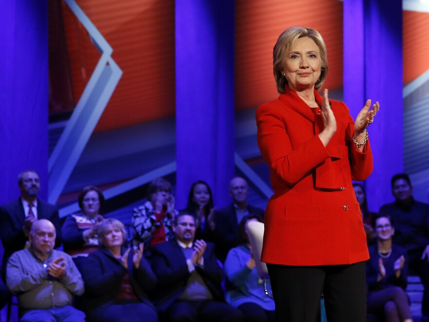 Democratic presidential candidate Hillary Clinton applauds after a CNN town hall at Drake University in Des Moines, Iowa, on Monday.