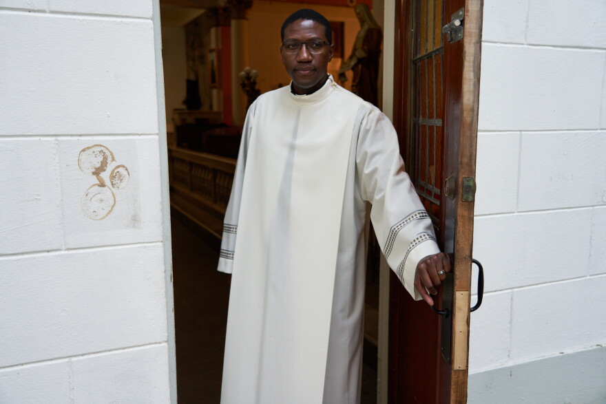 Father Emmanuel Mulenga is streaming online from St. Augustine Catholic Church of New Orleans during the COVID-19 pandemic. New Orleans, Louisiana. April 9, 2020.