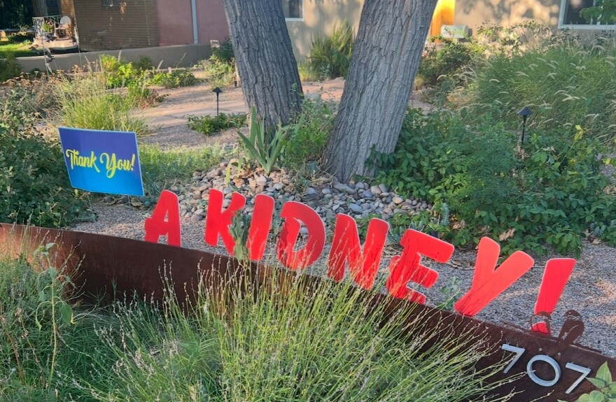 Plunket changed his "I need a kidney!" sign to simply, "a kidney!" after he was matched with his living donor, Ana June.
