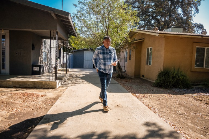 U.S. Rep. Adam Gray canvasses a neighborhood in West Modesto on Oct. 10, 2026. Gray is being challenged in the November election by Republican Kevin Lincoln, the former mayor of Stockton.