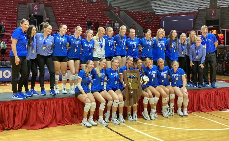 Carroll's volleyball team celebrates after winning its first IHSA state championship on November 9, 2024.