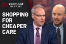 Two men in suits speak against a dark background with the text "Shopping for cheaper care."