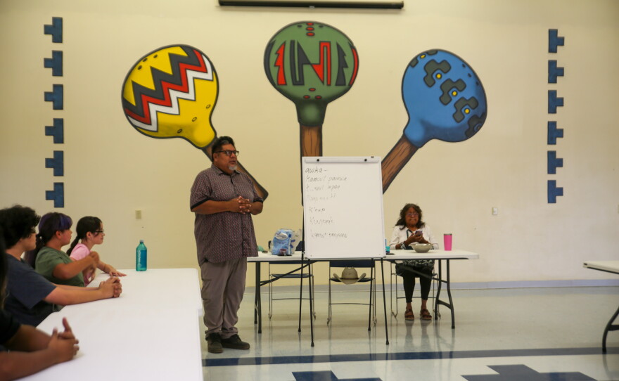 Joe Rodriguez, museum manager for the Cocopah Museum, asks the students for input on what might help them better retain the Cocopah words they learn.