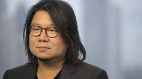 In this Friday, Aug. 25, 2017, photo, Singaporean novelist Kevin Kwan listens to a reporter's questions during an interview in Hong Kong. Kwan was in Hong Kong promoting the third and last book in his 'Crazy Rich' trilogy – 'Rich People Problems.' His first book "Crazy Rich Asians" released in 2013, rose quickly in the charts and became a best seller. (Vincent Yu/AP)