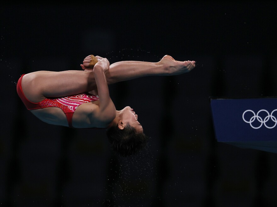 China's Quan Hongchan competes in the women's 10-meter platform final on Thursday at the Tokyo Aquatics Centre.