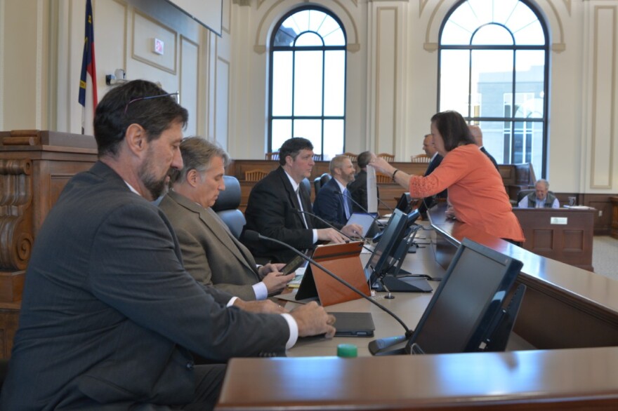 Haywood County commissioners prepare for a Jan. 21 meeting at the Historic Haywood County Courthouse.