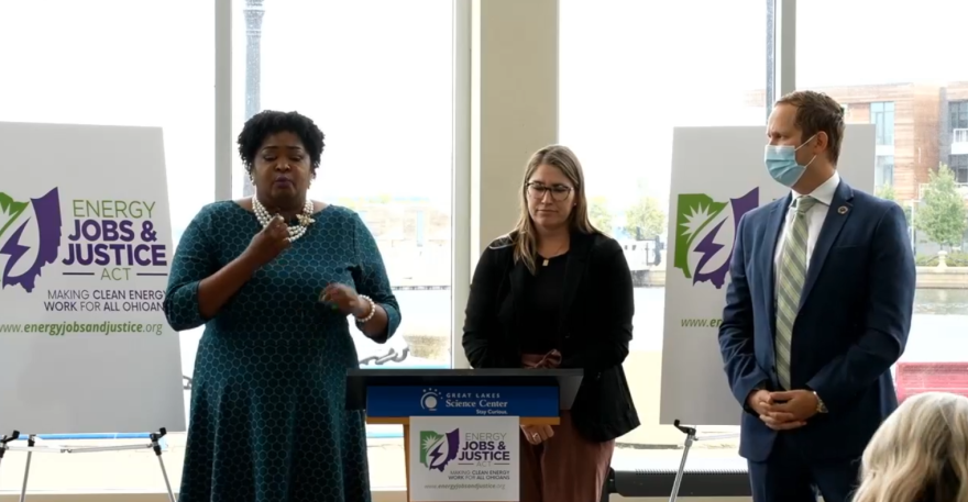 Stephanie Howse speaking with representatives at the Great Lakes Science Center in Cleveland.