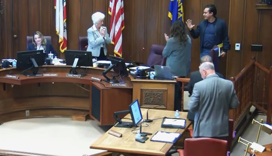 Escobedo received a round of applause before leaving the chambers.