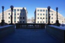 The office buildings behind Capitol building in Cheyenne, snow on the ground, clear skies