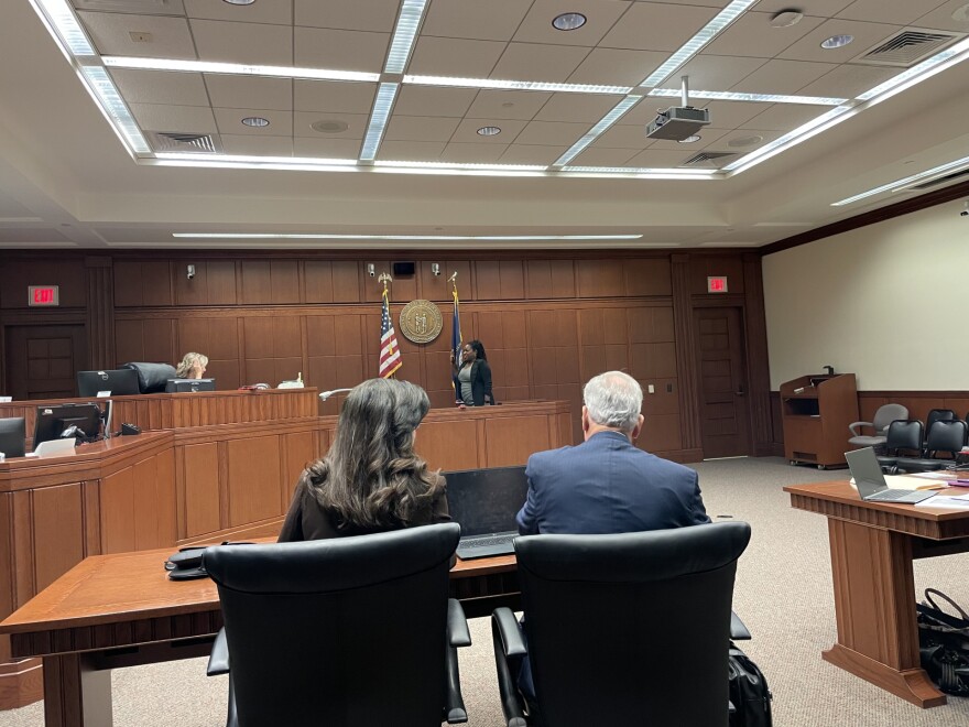 With her back to the camera-Brenda Monarrez and her attorney Ed Cooley during the Oct hearing