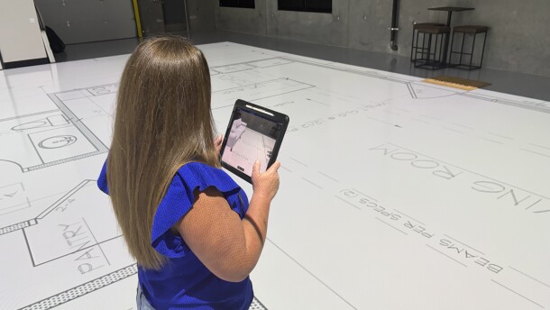 Andi Beasley uses augmented reality to place furniture and other details into a projection of her soon-to-be-built new home outside of Rose Hill.
