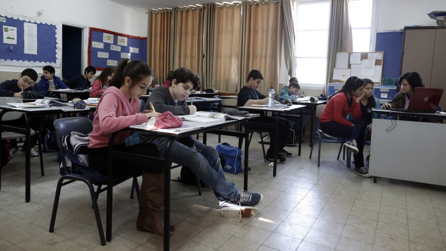 Israeli students attend class at an elementary school in the coastal city of Ashkelon. A U.S.-funded study released Monday said both Israeli and Palestinian textbooks present largely one-sided narratives of their conflict but rarely resort to demonization of the other side.