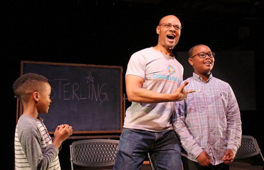 Sonny Kelly on stage in a talkback after 'The Talk' with his songs Langston (left) and Sterling (right).