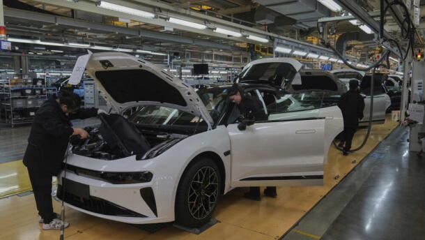 Workers assemble the Zeekr 001 EV models at the Chinese automaker Zeekr assembly plant, in Ningbo, east China's Zhejiang Province, Wednesday, April 17, 2025. (Andy Wong/AP)
