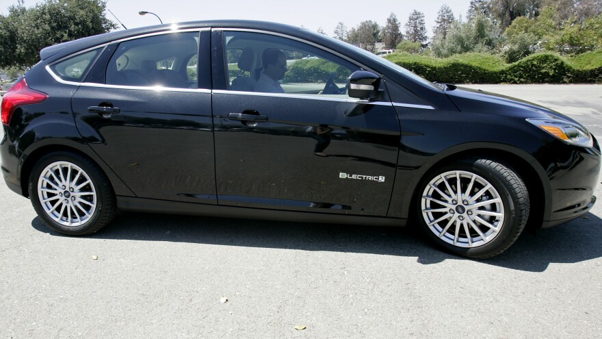 The Obama administration has set higher fuel economy standards for cars and promoted alternative energy sources. Here, a Ford Focus electric car is shown during a test drive in San Jose, Calif., in July.