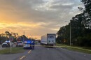 In this photo provided by the St. Johns County Sheriff's Office, the eastbound lanes of SR 16 between Outlet Mall Boulevard and Inman Road in St. Augustine, Fla., are shutdown after a fatal collision. 