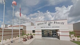 Outside the Benton County Sherriff office where McCollum was booked on charges of domestic violence.