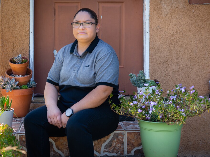 Carmen Quintero works at a distribution center that ships N95 masks and other products. She owes $1,840 for other care she received when she tried to get a coronavirus test.