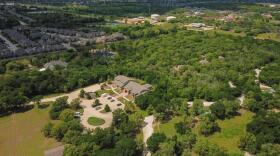 An aerial view of a sprawling green area.