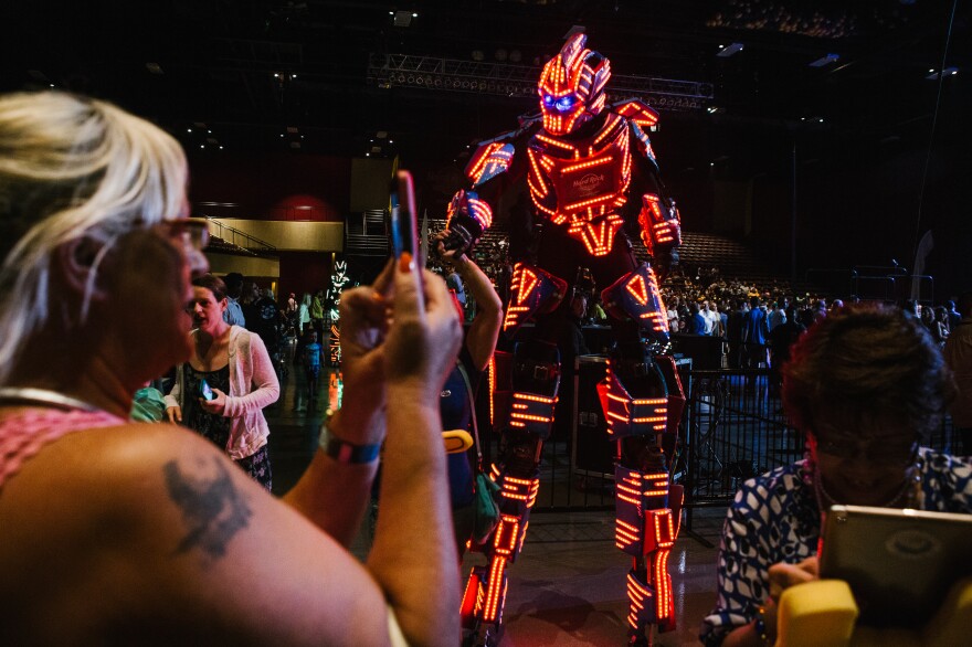 A performer helps entertain the crowd before the official opening of the Hard Rock Hotel and Casino in Atlantic City, N.J. on Thursday.