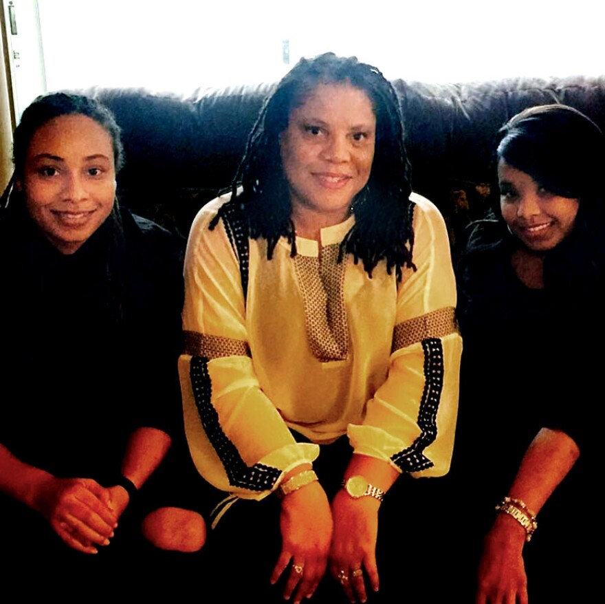 Sharon Burney with her two daughters, Yvonne, 32 (left) and 35-year-old Tamisha (right). (Karly Wallace/WUFT News)