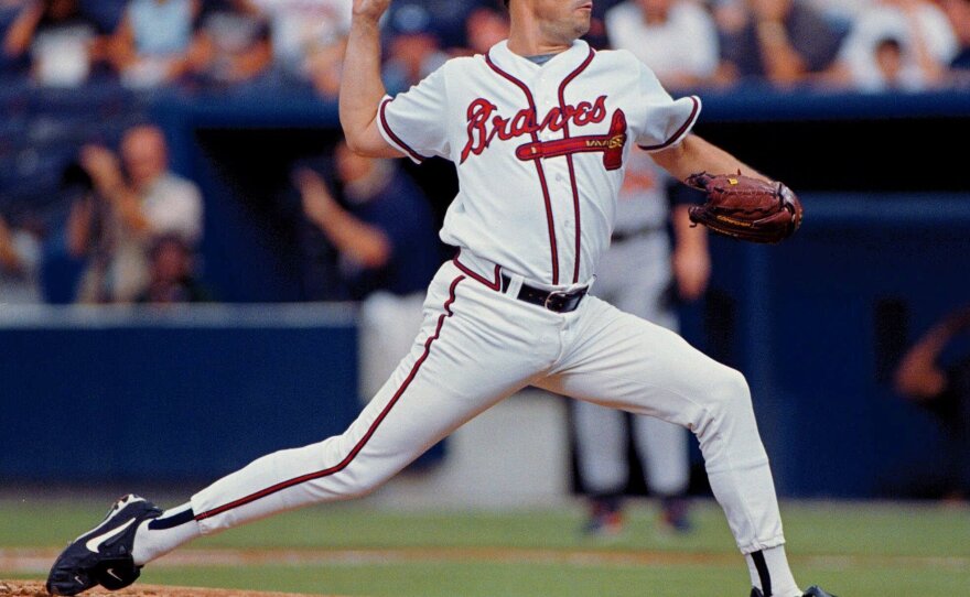 Atlanta Braves starting pitcher Greg Maddux delivers to a Baltimore Orioles batter at Turner Field in Atlanta in 1999.