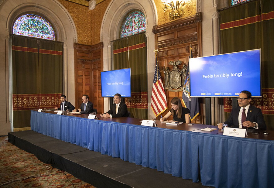 Gov. Andrew Cuomo and staff at the daily COVID-19 briefing at the State Capitol in Albany on Wednesday.