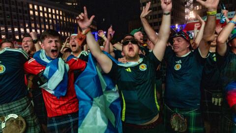 Scottish fans erupt as Scotland holds on to win their first game of the World Cup against Haiti 1-0 at the FIFA Fan Festival Boston at City Hall Plaza. (Jesse Costa/WBUR)