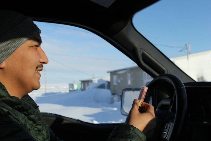 The lead of Kaktovik polar bear patrol, Nathan Gordon Jr., looks at one of the rounds for deterring bears on March, 3, 2026.