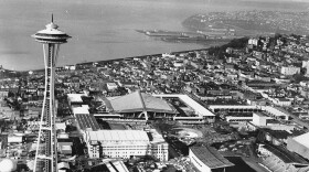 This is a photo of Seattle during the World's Fair on Feb. 12, 1962.  Beyond is a view of Puget Sound and the 600 foot Space Needle to the left.