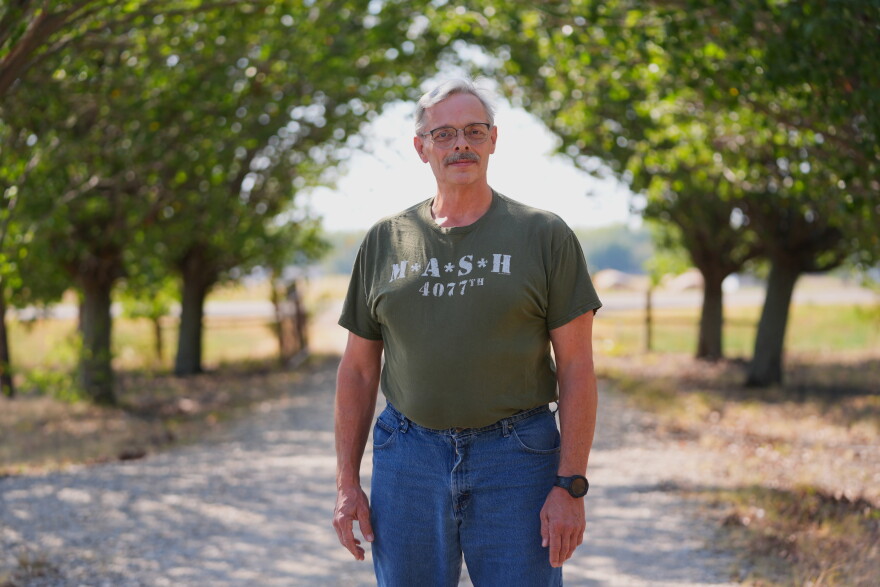 Ed Westrick poses for a photo at his home's driveway near Commerce, Texas, on Sept. 18, 2026.