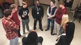 A restorative justice dialog circle of people.