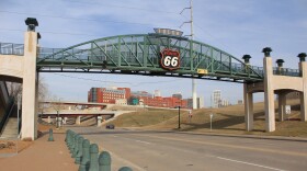 The Route 66 pedestrian bridge and sign is seen in downtown Tulsa.