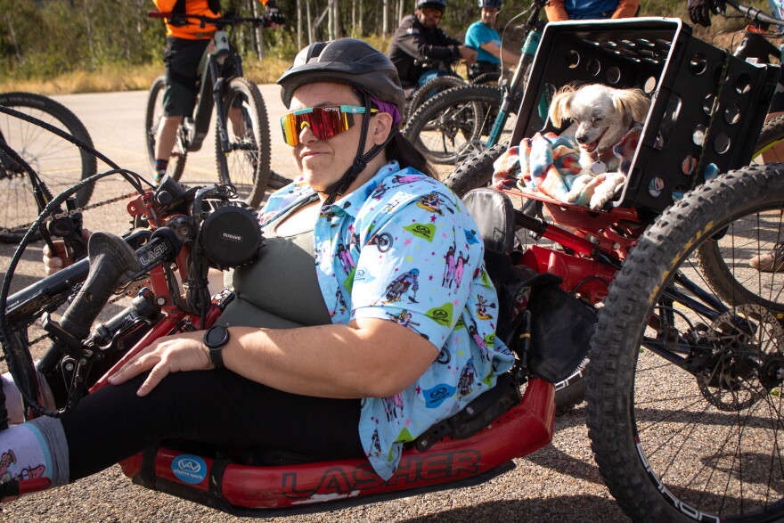 Amanda King and her dog, Faith, before the ride, Sept. 10, 2026.