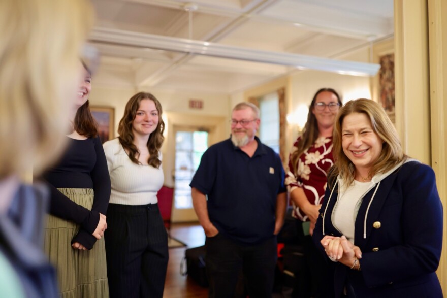 Tunkhannock Area High School students Katie Allen (left in green skirt) and Carleigh Scholz (second from left) meet with Pennsylvania's First Lady Lori Shapiro (right) at an event announcing the the official rollout of free menstrual products across 68 Pennsylvania state parks.