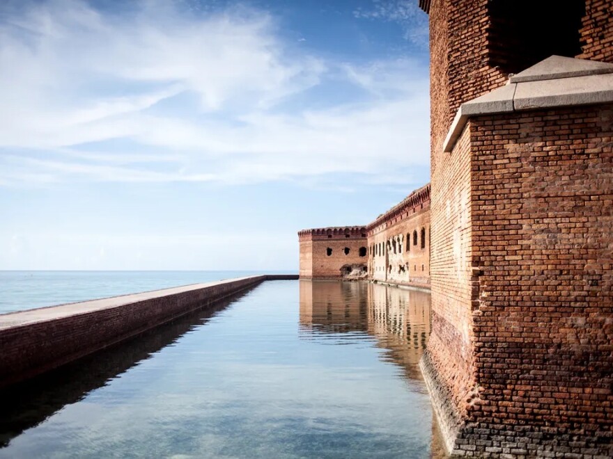 Fort Jefferson, surrounded by a mote pictured above, was built in the Dry Tortugas, located 70 miles west of Key West, using 16 million bricks in the 19th century. The National Park Service says about $33 million in repairs are needed at the park's 11 buildings. 