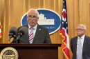 Sen. Terry Johnson (R-McDermott, left) and Gov. Mike DeWine (right) in August 2026.